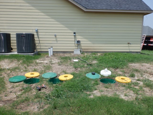 several opened septic tank